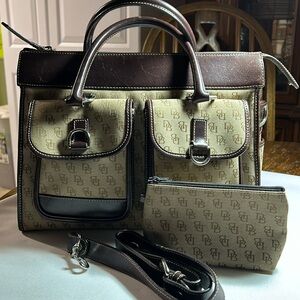 Dooney Bourke cloth and leather purse brown/tan with DB, make up bag/strap.Nice.